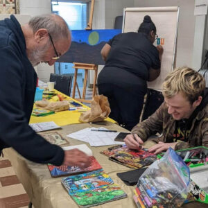 community members making art at Chosen Family art project with Niagara Falls Family Pride, 2022